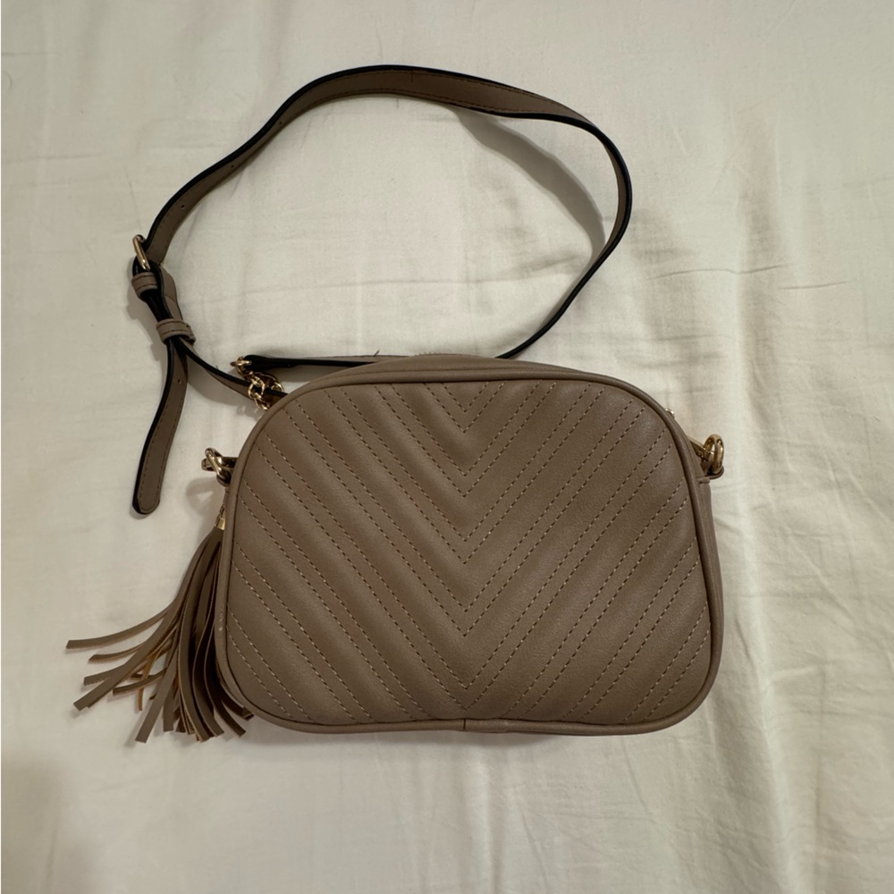 Beige tassel crossbody bag